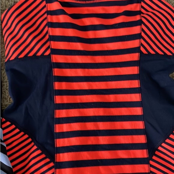 Set of two Lululemon size 4 workout tanks. - Picture 3 of 4